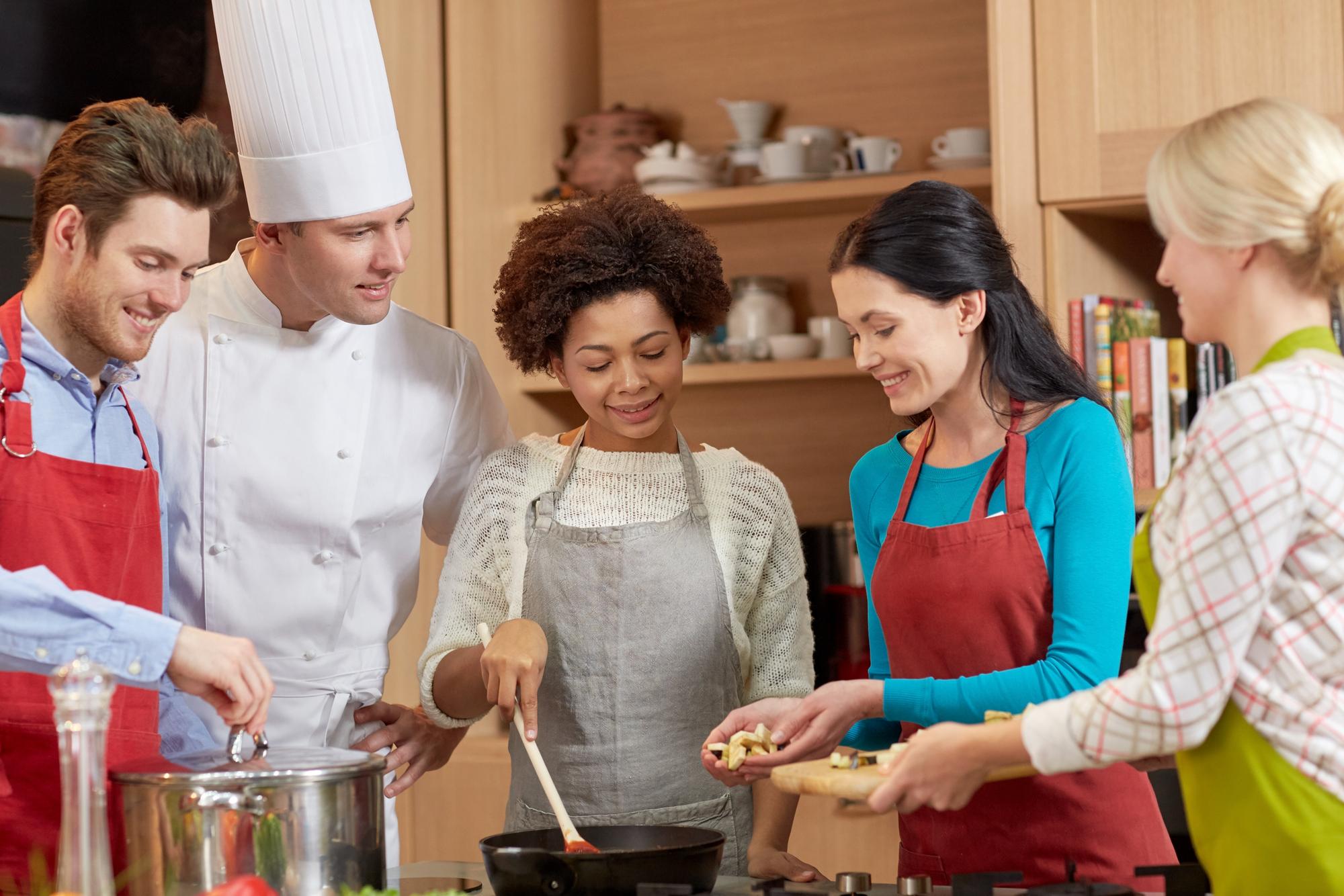 workshop chef teaching technique with students