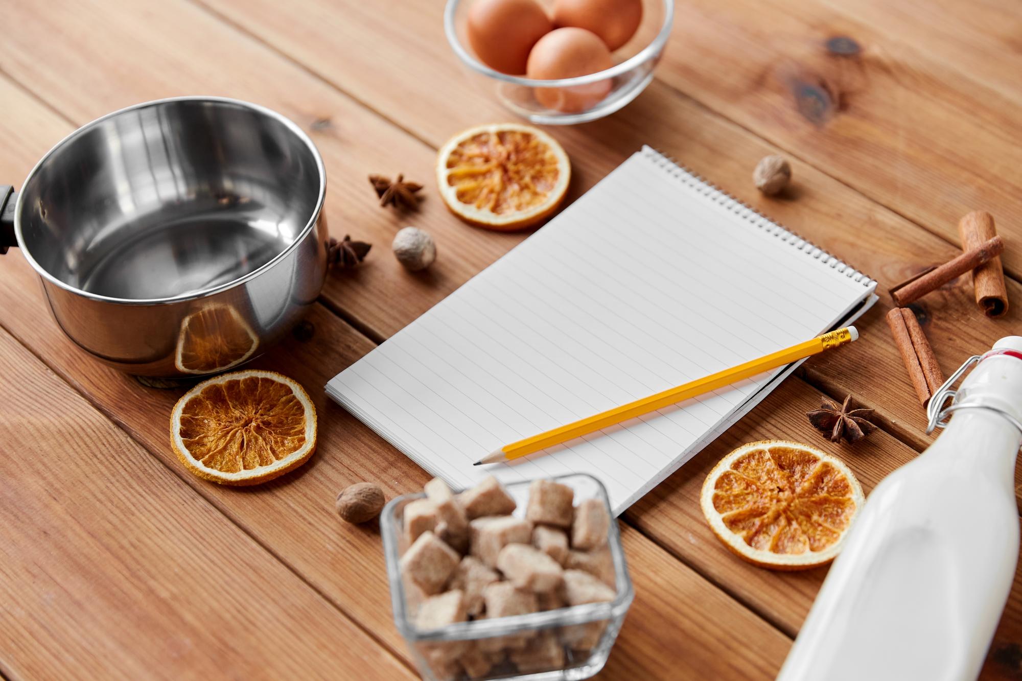 stack of recipe notebooks and tasting notes